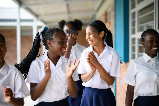A group of happy school girls.